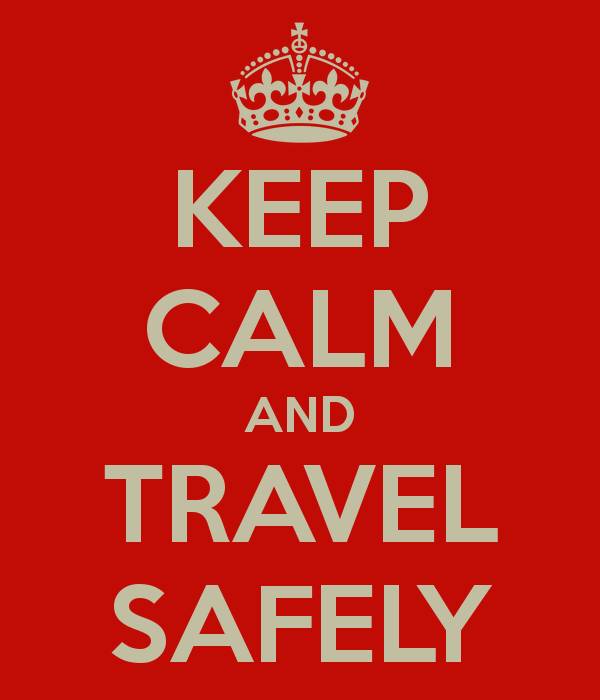 Red background with white text that states, "Keep calm and travel safely."